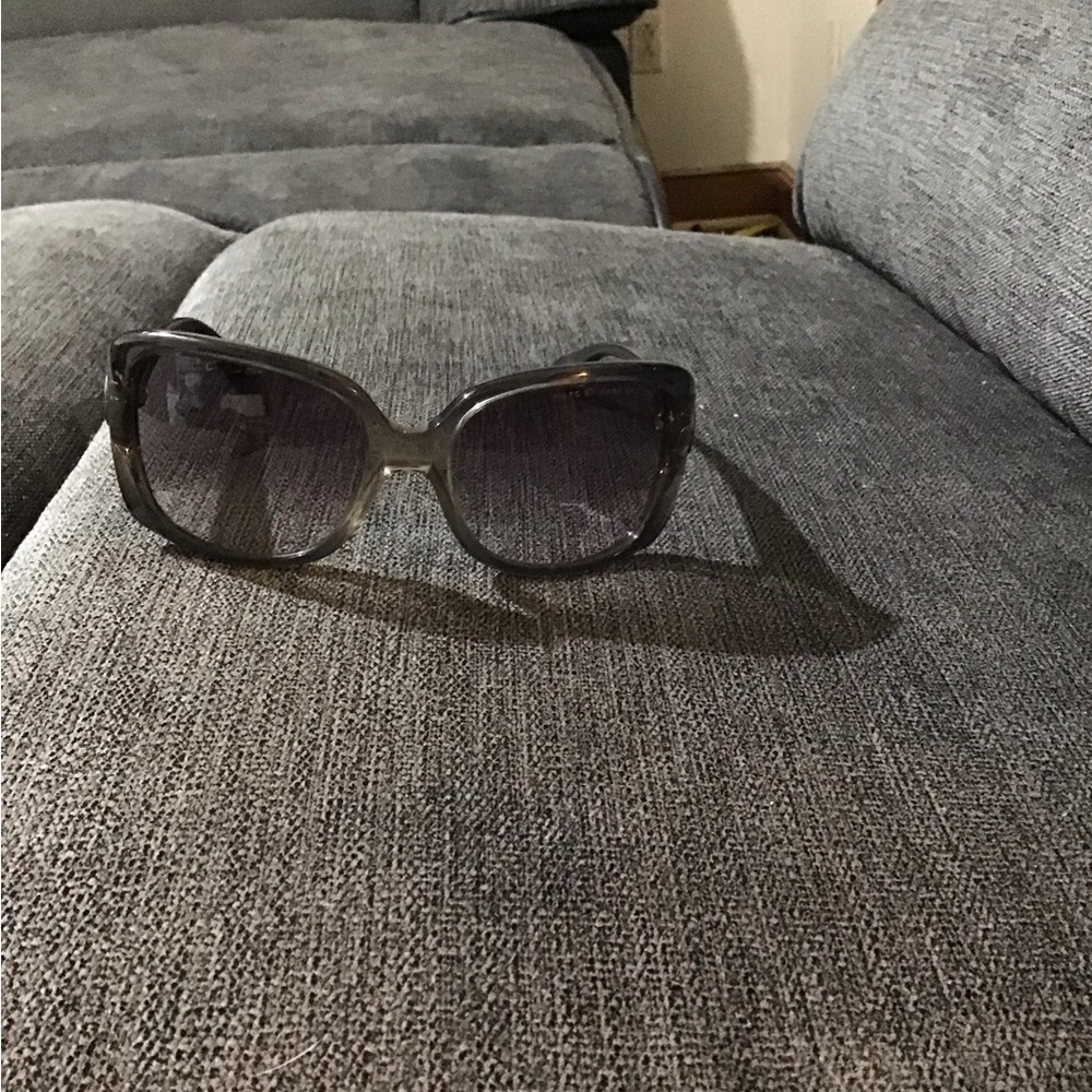 Woman’s black Marc by Marc Jacobs sunglasses